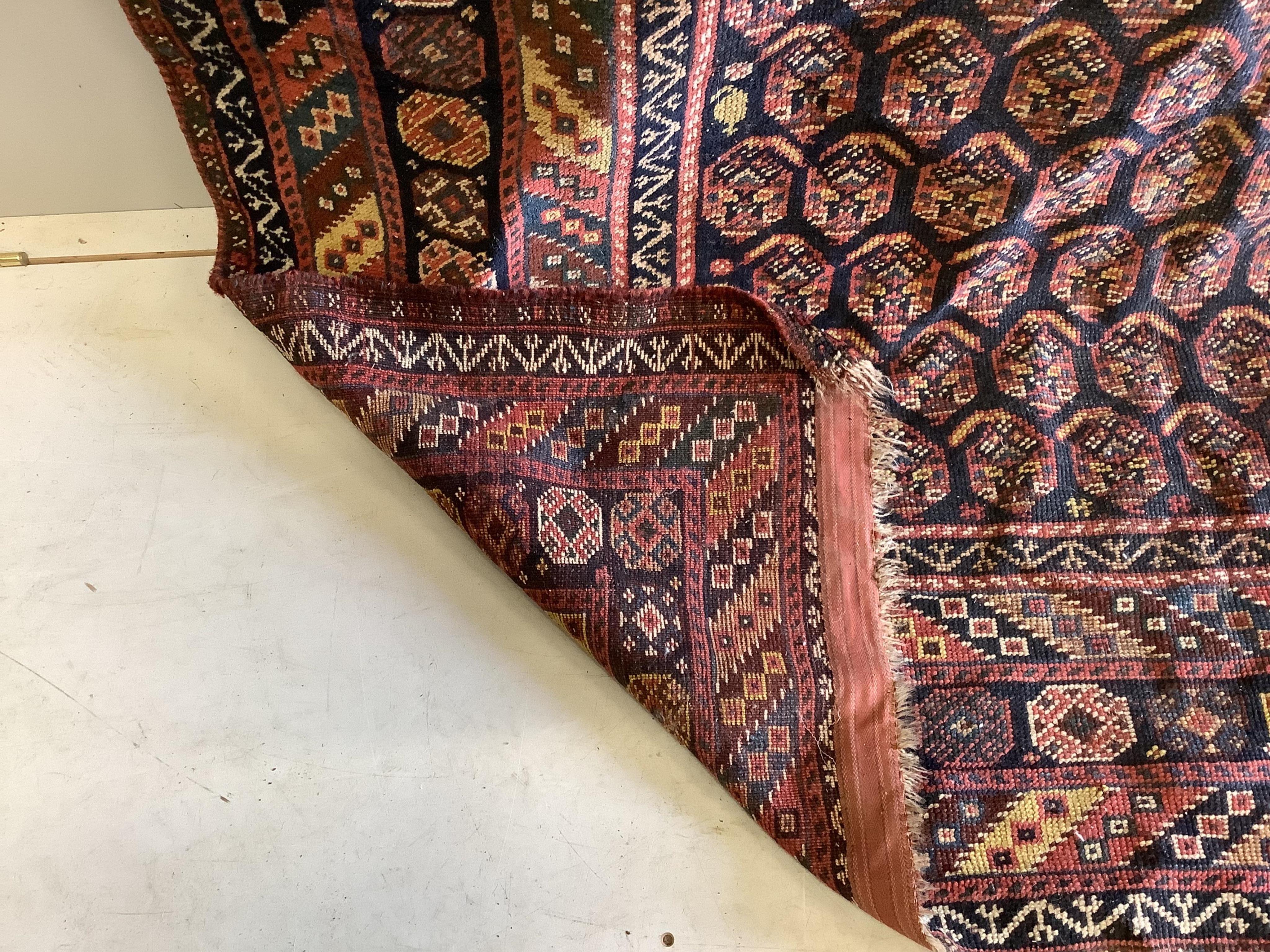 An antique Shirvan blue ground Boteh carpet, 290 x 170cm. Condition - fair